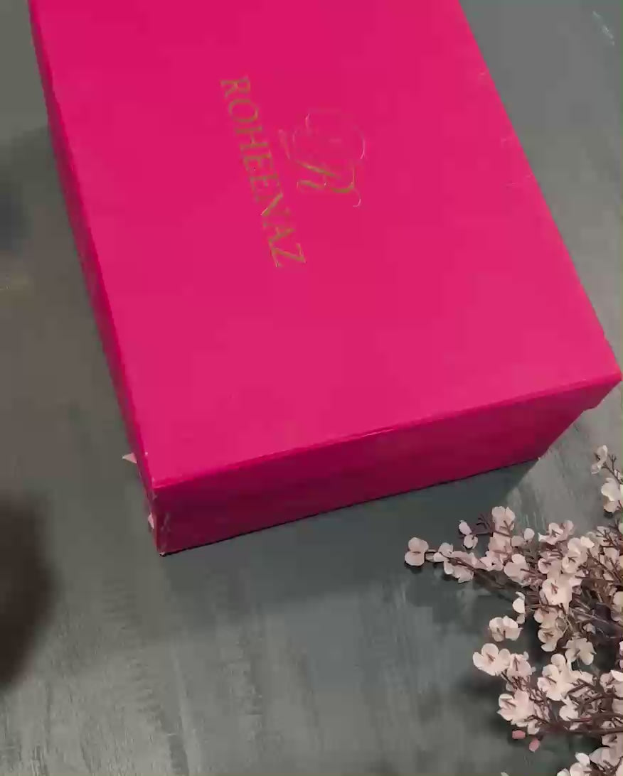 Unboxing the Radiant Muse suit from Roheenaz's signature pink gift box packaging