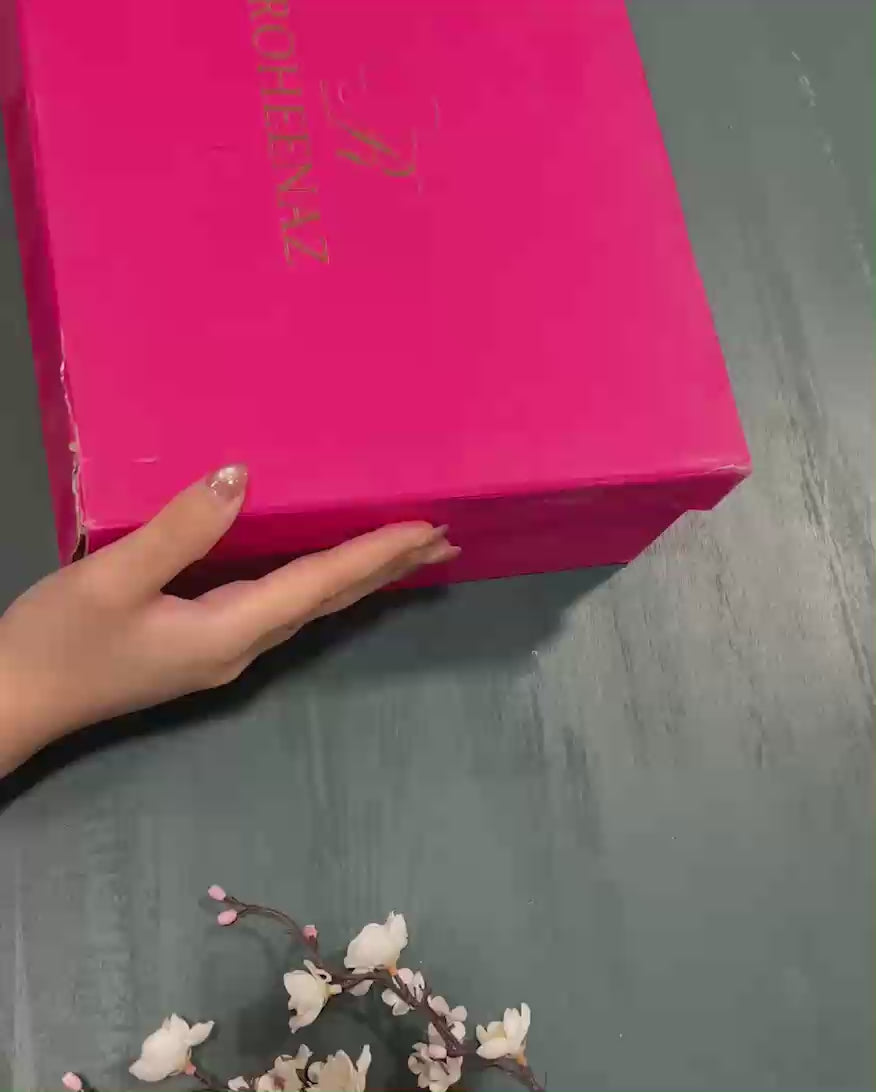 Unboxing the Noble Allure suit from Roheenaz's signature pink gift box packaging