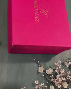 Unboxing the Blush Whisper suit from Roheenaz's signature pink gift box packaging